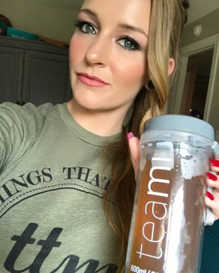 Teen Mom star Maci Bookout poses for a picture after her workout.